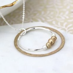 Mooch..... Peace Of Mind Silver Plated Silver Plated Silver And Gold Plated Hoops And Beads Necklace