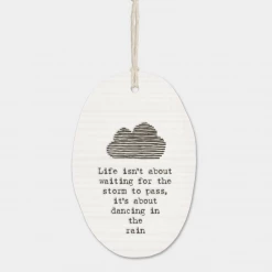 Mooch-andover Baby Gifts East Of India Porcelain Oval Message Hanger - "Life Isn't About Waiting For The Storm To Pass...."